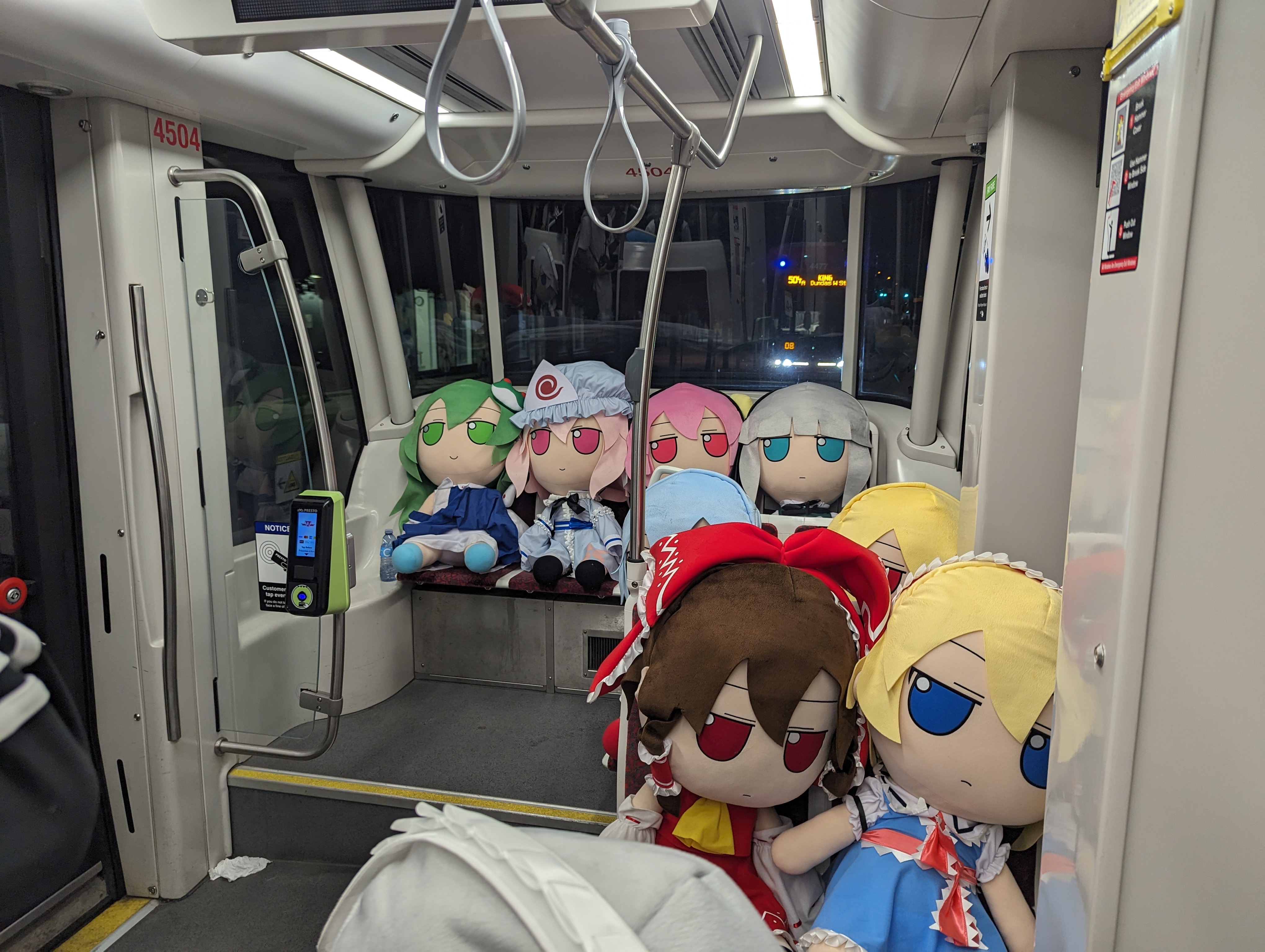 example image of a couple fumos in a tram